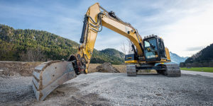 huge heavy shovel excavator digger on gravel construction site